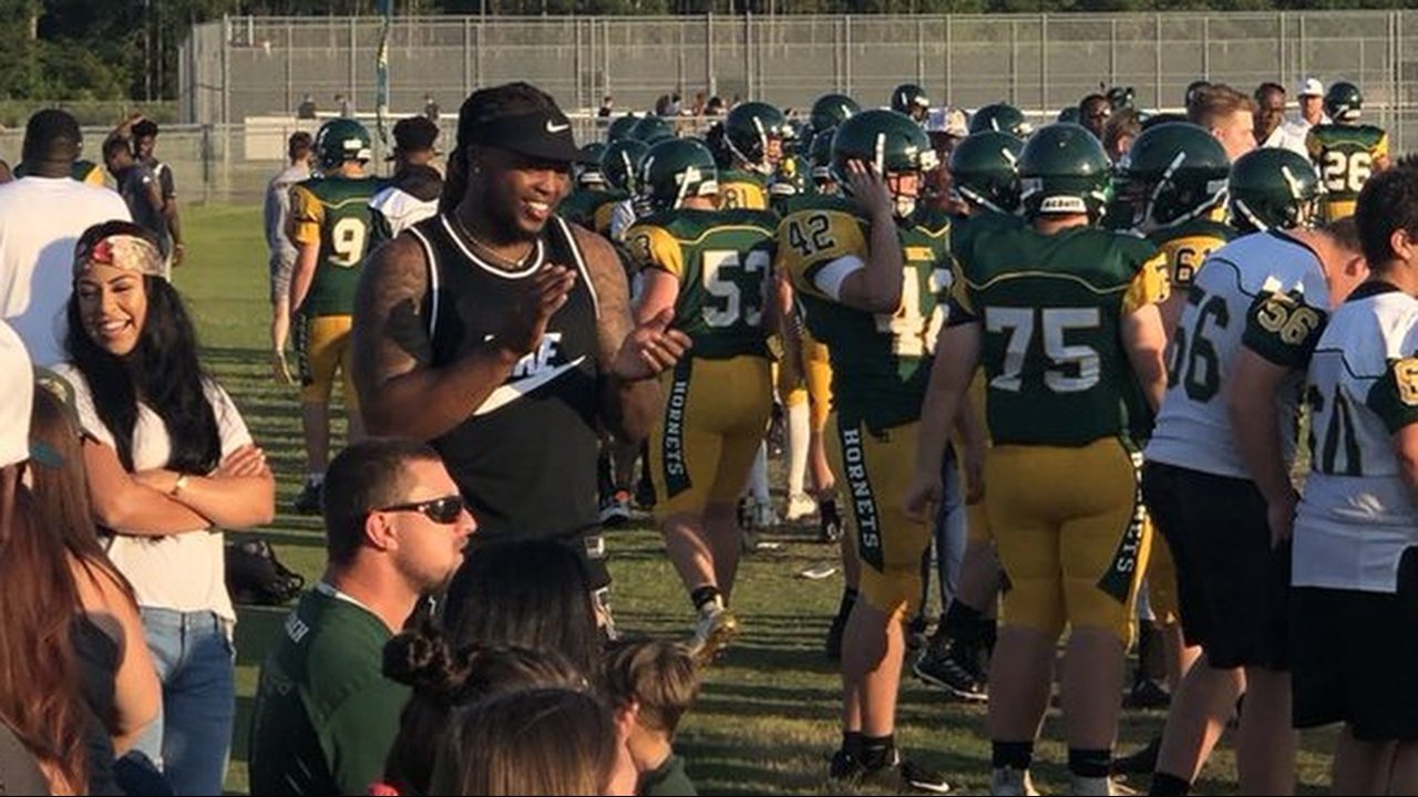 Yulee turns out to honor iconic football running back Derrick...